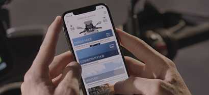 Detailed view of BMW Motorrad ConnectedRide Cradle smartphone in portrait format