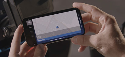 Detailed view of BMW Motorrad ConnectedRide Cradle smartphone in landscape format